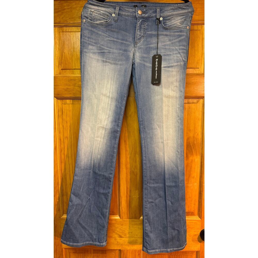 Women's Bebe boot cut Jeans NEW w/tags Light Wash SIZE 28